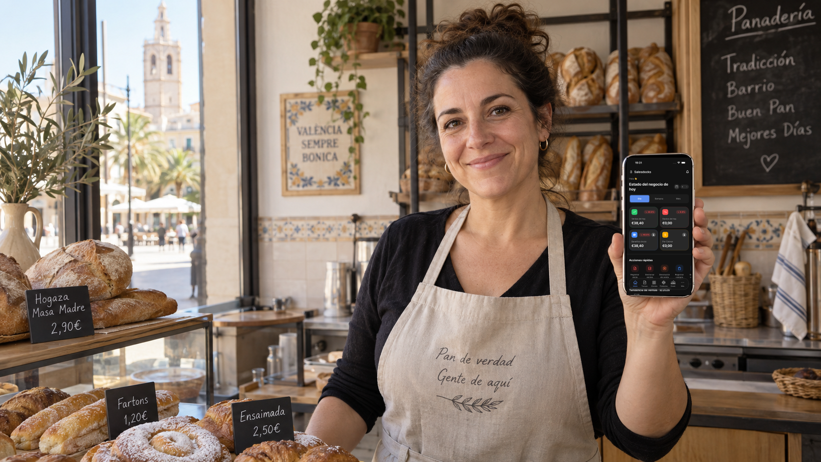 Propietaria de una panadería de Valencia consulta la pantalla de inicio de Salesdocks en español antes de abrir