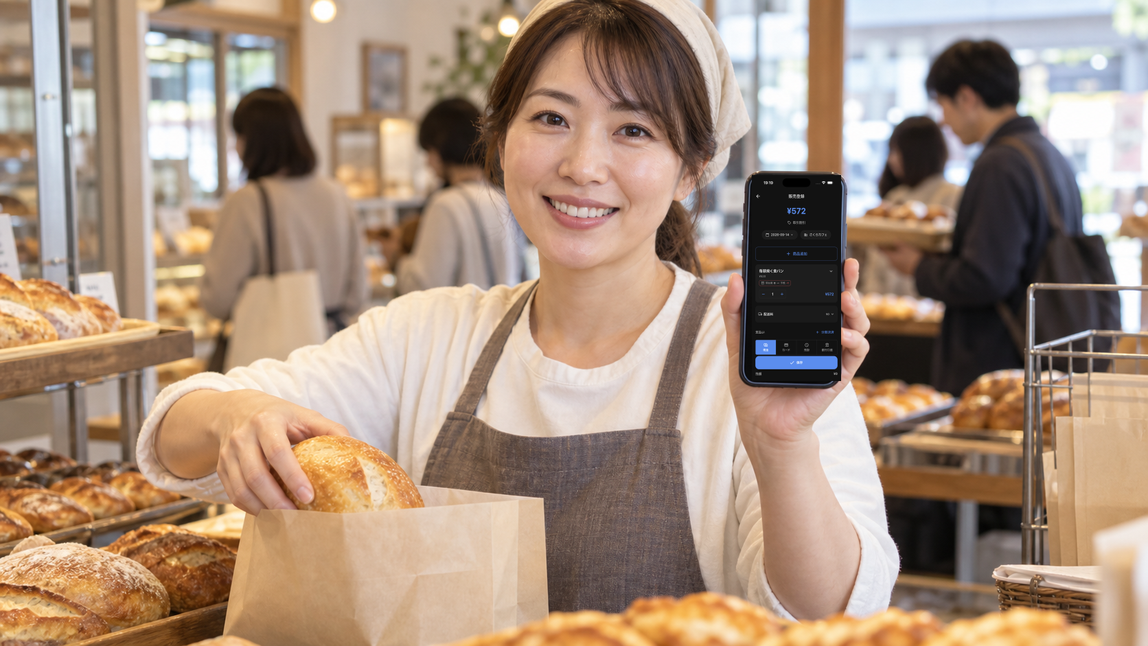 営業中に日本語版Salesdocksの販売登録画面で一件の売上を入力するベーカリー店主
